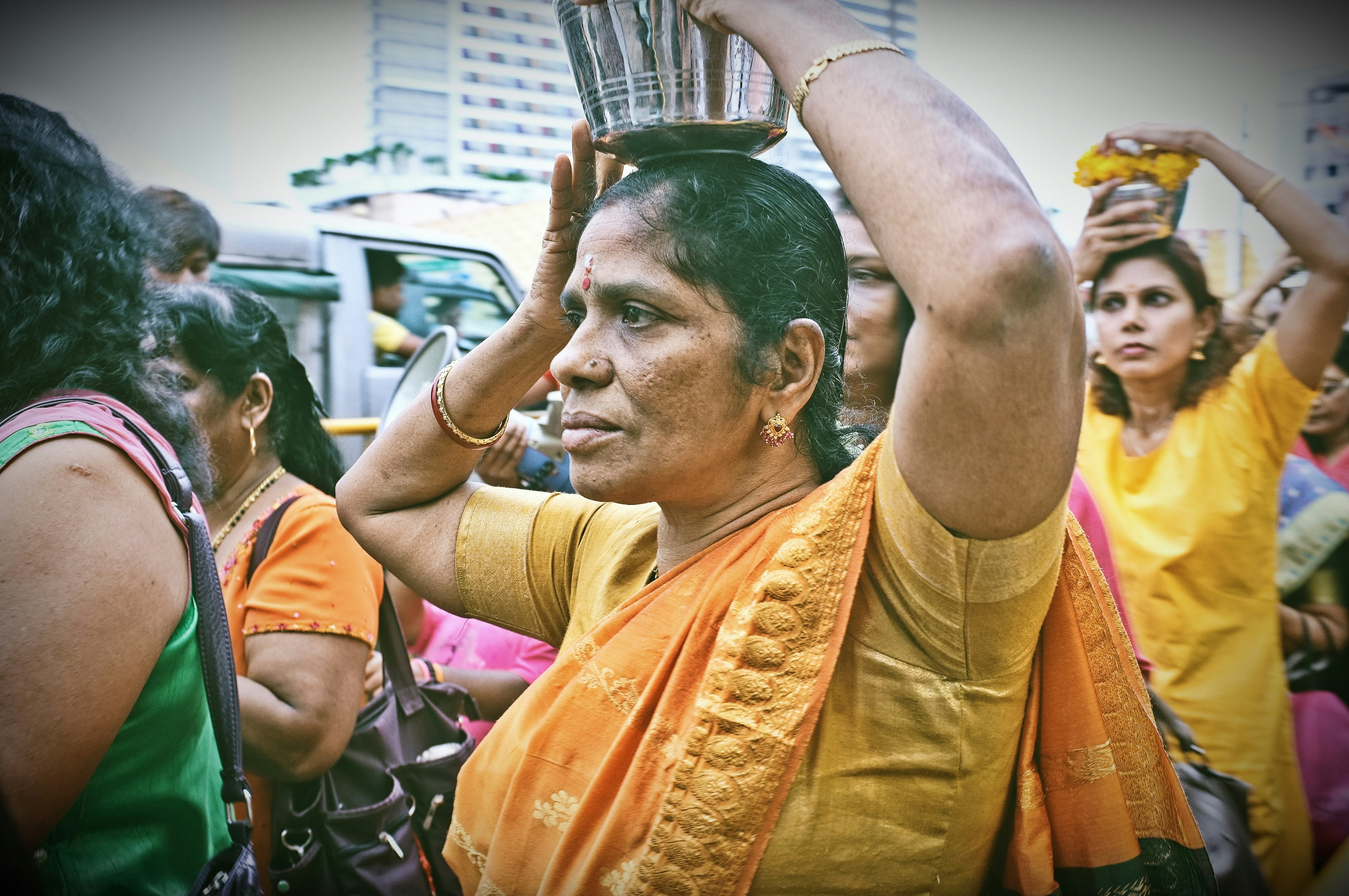 women in yellow and orange clothes